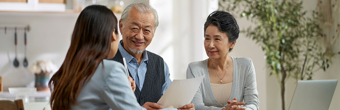 Clients in a meeting with a financial advisor